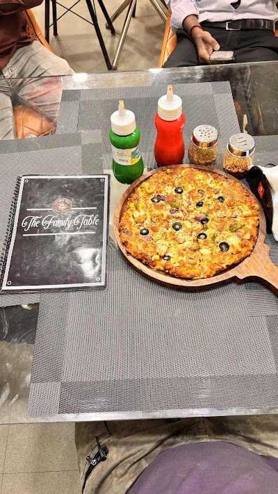 BAKEP6LKCOK7_The_Family_table_ChIJvVV992ND8jkRSLXFbNKdTZc_4