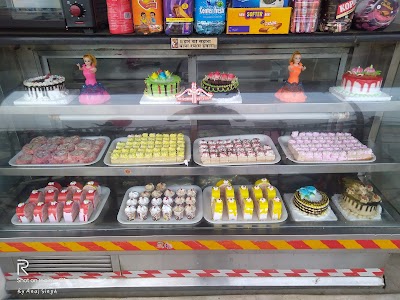 BAKEZF9XXYLI_________________________________ChIJp7JYgEEX8jkROh-H56VP0Qw_1