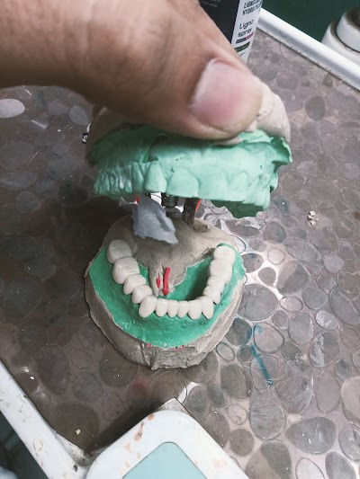 DENTZ3ZJQ4KU_smile_Dental_care__dr_ravi_kumar_BDS_MDS____ex-resident_TMH_mumbai__ChIJg_5G1Uwf8jkRvurApF3LqgU_4