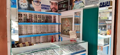 OPTXHDQ7M18Z_Zoom_Eye_Care___Optical_ChIJhSDnx7gr8jkRyRRQ40ZSV2Q_6